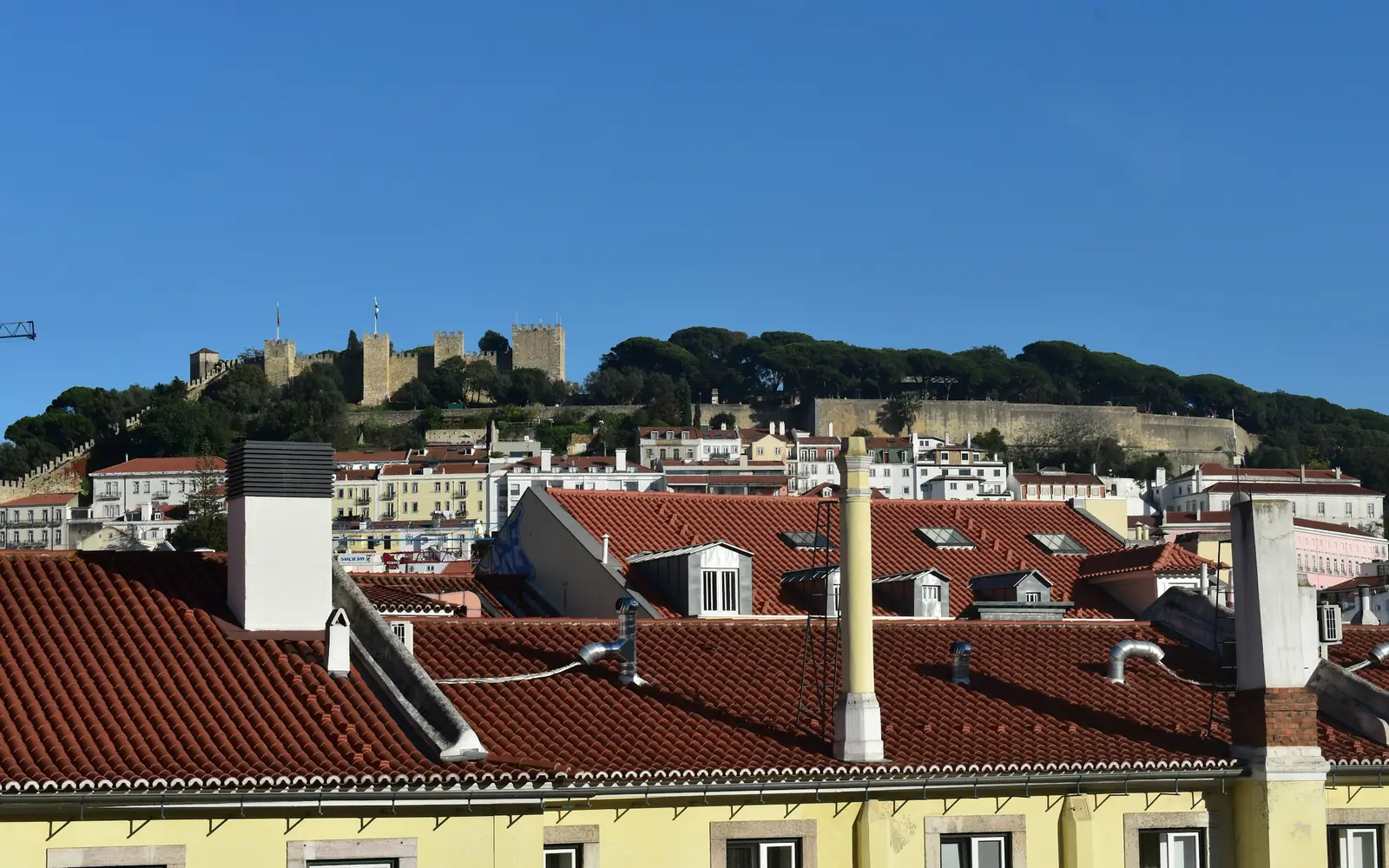Castelo de São Jorge seen across the roofs of Lisbon