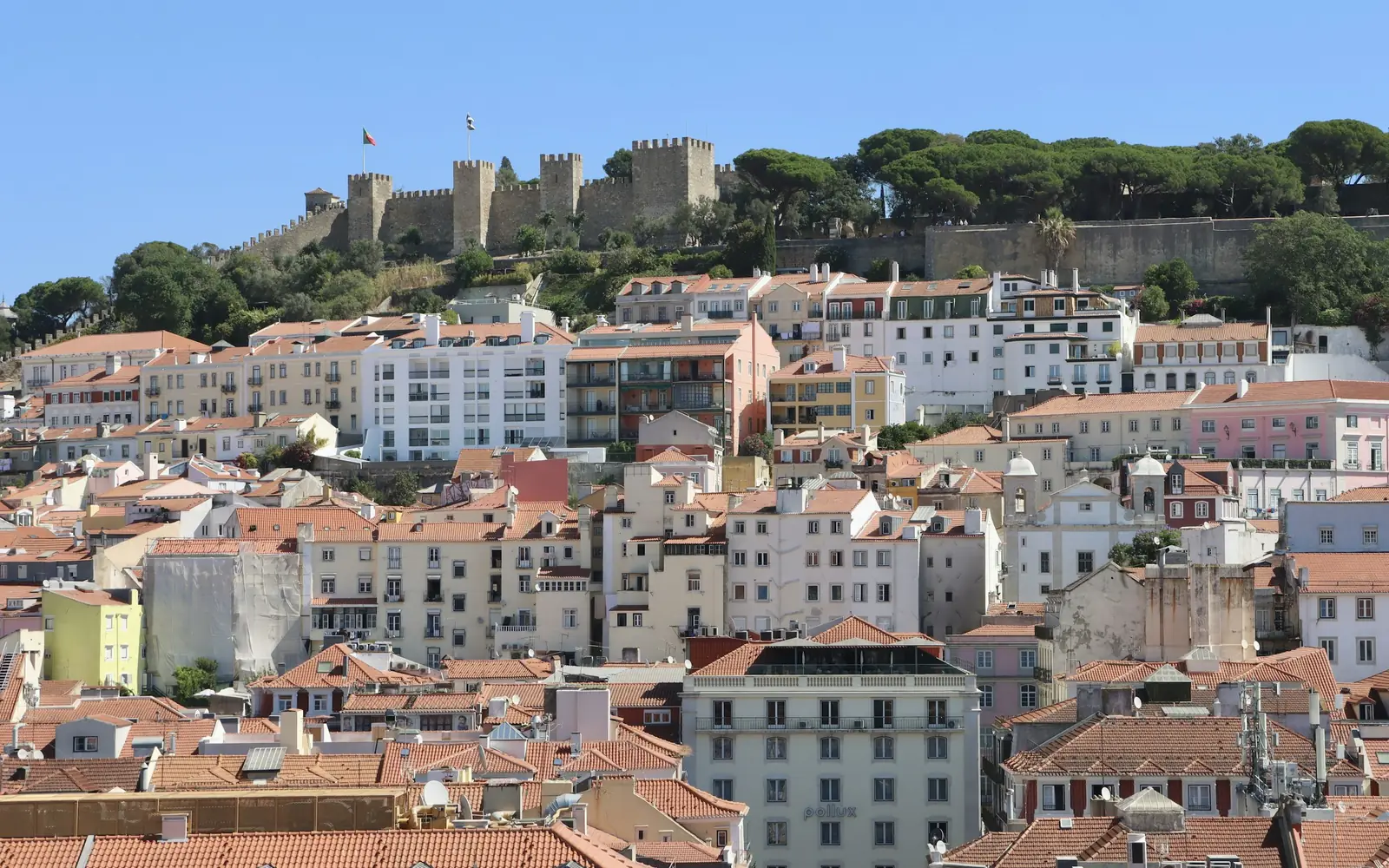 The tiled roofs of Lisbon rising towards the castle hill